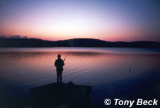 Man fishing from dock